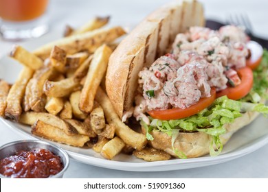 A Lobster Po' Boy sandwich and fries