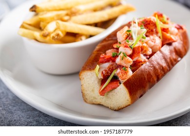 Lobster Roll Served With Fries And White Wine For Lunch Or Dinner