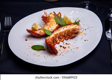Lobster tail in maple-truffle sauce with lemon and basil