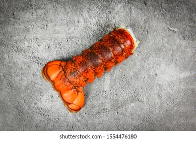 Lobster Tail On Dark Plate Background / Red Lobster Food On Dining Table