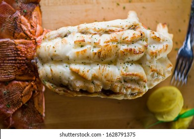 Lobster Tail, Served With Drawn Butter And Lemon Wedges. Maine Lobster Tail, Classic American Restaurant Favorite. Seasoned With Salt And Pepper And Garnished With Italian Parsley.