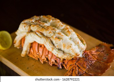 Lobster Tail, Served With Drawn Butter And Lemon Wedges. Maine Lobster Tail, Classic American Restaurant Favorite. Seasoned With Salt And Pepper And Garnished With Italian Parsley.