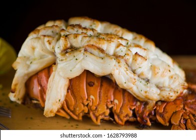 Lobster Tail, Served With Drawn Butter And Lemon Wedges. Maine Lobster Tail, Classic American Restaurant Favorite. Seasoned With Salt And Pepper And Garnished With Italian Parsley.