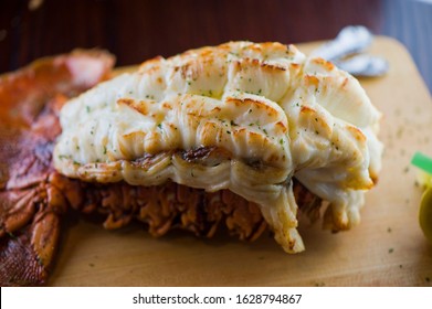 Lobster Tail, Served With Drawn Butter And Lemon Wedges. Maine Lobster Tail, Classic American Restaurant Favorite. Seasoned With Salt And Pepper And Garnished With Italian Parsley.