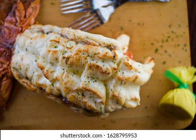 Lobster Tail, Served With Drawn Butter And Lemon Wedges. Maine Lobster Tail, Classic American Restaurant Favorite. Seasoned With Salt And Pepper And Garnished With Italian Parsley.