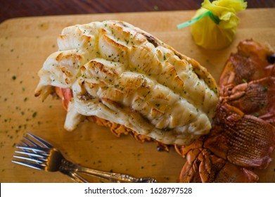 Lobster Tail, Served With Drawn Butter And Lemon Wedges. Maine Lobster Tail, Classic American Restaurant Favorite. Seasoned With Salt And Pepper And Garnished With Italian Parsley.