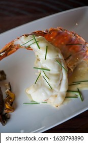 Lobster Tail, Served With Drawn Butter And Lemon Wedges. Maine Lobster Tail, Classic American Restaurant Favorite. Seasoned With Salt And Pepper And Garnished With Italian Parsley.