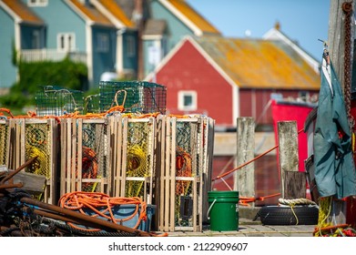 Lobster traps, boats and houses, in the fishing village of Peggy's Cove, Nova Scotia, Canada