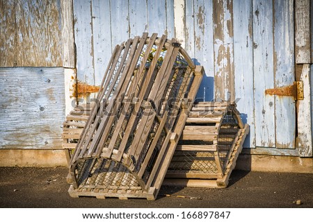 Lobster traps propped up on a wharf in rural Prince Edward Island, Canada.