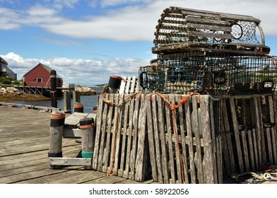 Lobster traps stored on wharf of Peggy's Cove fishing village in Nova Scotia