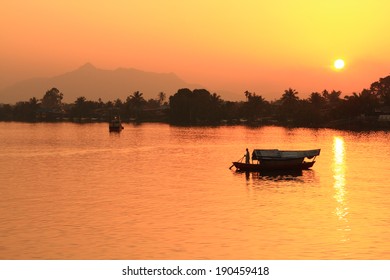 Local Boat Sunset. Borneo, Sarawak, Malaysia.