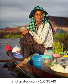 Local Cambodian Seller In Floating Market, Cambodia