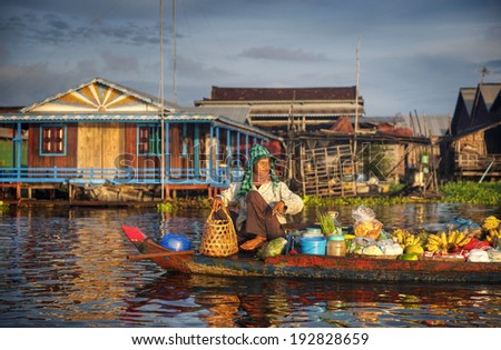 Local Cambodian seller in floating market.