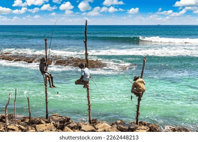 Local Fishermen fishing in traditional way at the beach in Sri Lanka - Powered by Shutterstock