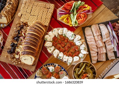 Local food in Romania on a wooden table - Shutterstock ID 1686320839