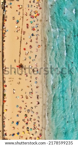 Similar – Luftaufnahme von fliegenden Drohnen der Menschenmenge, die sich am Strand in Rumänien am Schwarzen Meer entspannen.