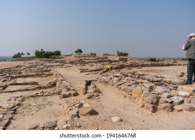 Local Guide Explaining Ancient Archeology To Tourists At The Citadel At Indus Valley Civilization Or Harappan Civilisation Ruins At Dholavira, Kutch, India On 27th November, 2020 