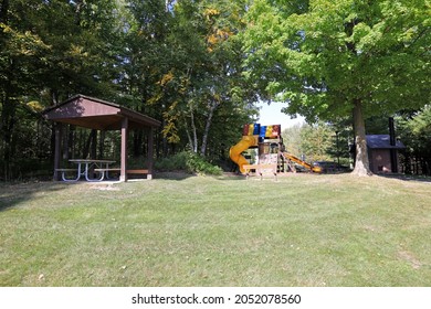 Local Park At Walloon Lake, Michigan, With Access To The Lake, Picnic Tables, And Playground Equipment For Children, As Well As Rest Rooms.  Located At The End Of Resort Pike Road.