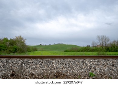 local railway tracks, in horizontal lines, in the Tuscan countryside. background. graphic, geometric, bands. - Powered by Shutterstock