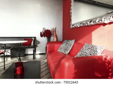 Local red interior, sofa and pillows