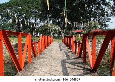 Local Small Steel Bridge Over The Small River In The Village.