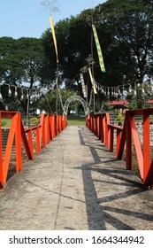 Local Small Steel Bridge Over The Small River In The Village.