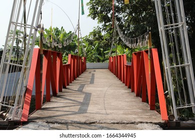 Local Small Steel Bridge Over The Small River In The Village.