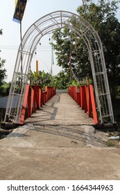 Local Small Steel Bridge Over The Small River In The Village.