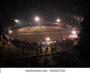 Local Stadium For Cricket Match.People Around The Playground In Night Of Top View. There Are Crowds Around The Middle Of The Night To Watch The Game.Top View And Arial Photography.