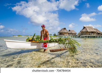 Local Tahitian Man Was Canoeing For Food Delivery In Tikehau Island Resort In French Polynesia.