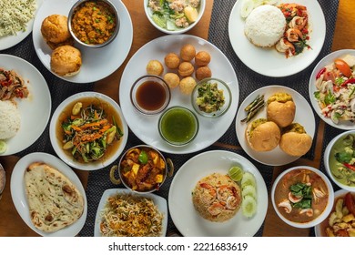 Local Thai And Indian Food Set , these Thai dishes are popular with foreigners, Panipuri or fuchka fhuchka or gupchup or golgappa or Pani ke Patake is a type of snack that originated in the Indian sub - Shutterstock ID 2221683619