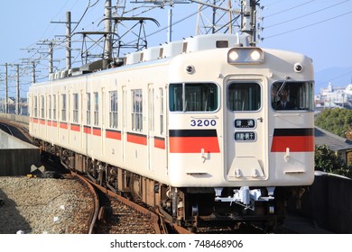 The local train running on the elevated rail in Hyogo Japan. (Translation; Japanese language in the image is read as Local Train running between Shikama Station and Aboshi Station.)