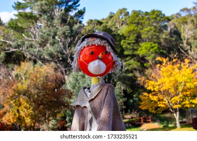 The Locals Decorate The Country Town Of Balingup, Western Australia With Scarecrows To Welcome Tourists. This One Is Wearing A Face Mask, A Rural Reminder To Protect From Corona Virus, Covid 19.