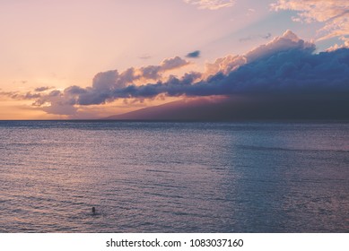Locals Enjoy A Sunset Swim In Oneloa Bay On The Island Of Maui