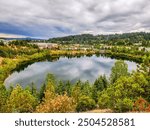 Located at Progress Ridge TownSquare, this park features a quarry lake, water fountain, and paved trail with dock access. The park is next to shopping, dinning, and cinema destinations.