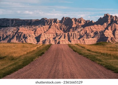 Located in southwestern South Dakota, Badlands National Park consists of 244,000 acres of sharply eroded buttes, pinnacles and spires surrounded by a mixed-grass prairie ecosystem.  - Powered by Shutterstock