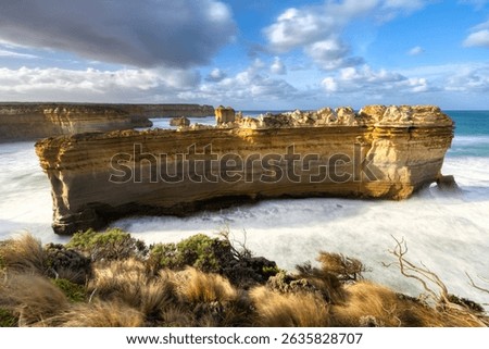 Loch Ard Gorge Natural Limestone Arch with Misty Waves, Great Ocean Road Australia