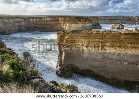 Loch Ard Gorge Natural Limestone Arch with Misty Waves, Great Ocean Road Australia