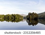 Loch Katrine, showing the peninsula Am Priosan, Beinn Bhreac, and Ellen