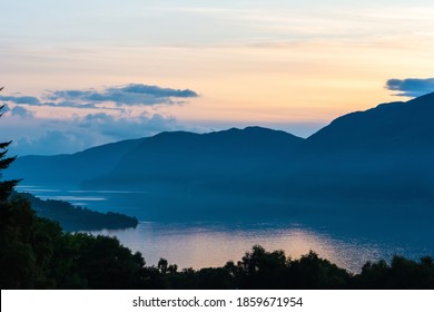 Loch Ness Lake In Scotland, At Sunset. 