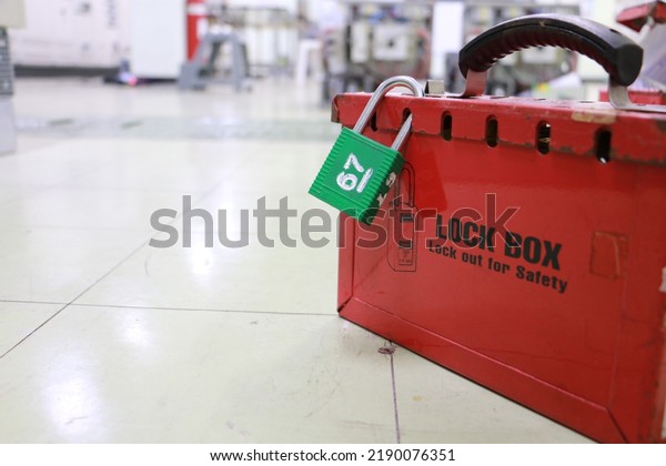 Lock box and switch gear room\
background ,Lockout Tagout , Electrical safety system.Key lock\
switch or circuit breaker for safety protect.in electric\
room