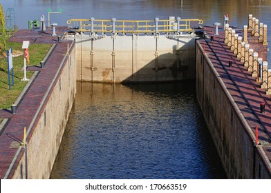 Lock Gates Of The Water Dam In River 