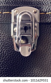 Lock Of A Guitar Case, Closeup, The Steel Metal Lock Is Closed