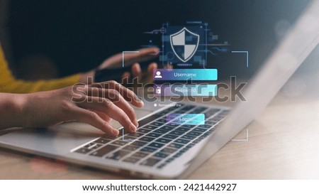 A lock icon, and security code show on the change password page while a business person using a laptop computer. Cyber security technology on websites or apps for data protection.