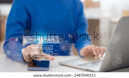 A lock icon, and security code show on the change password page while a business person using a laptop computer. Cyber security technology on websites or apps for data protection.