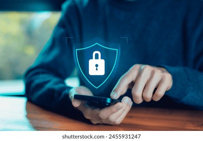 lock mark protects attacks from a hacker on a smartphone and internet cybersecurity. concept of secure data from viruses cyber, and crime. password security and privacy on an online system