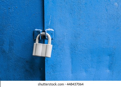 Lock on the blue metal door. Close-up