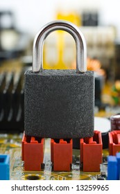 Lock on computer board, security concept background
