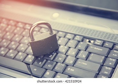 Lock On The Laptop Keyboard Background