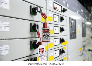 Lock out and Tag out , Lockout station, machine  specific lockout devices and lockout point. Electrical switchgear, Industrial electrical switch panel at substation in industrial zone at power plant